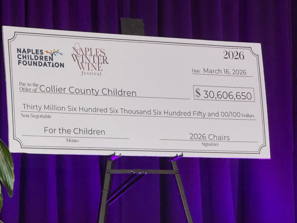 check displaying over $30 million raised from NWWF that will be distributed to NCF beneficiaries